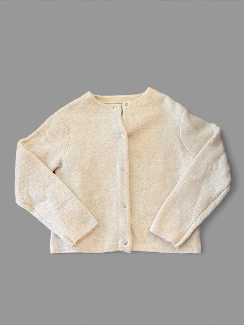 Beige cardigan with snap buttons